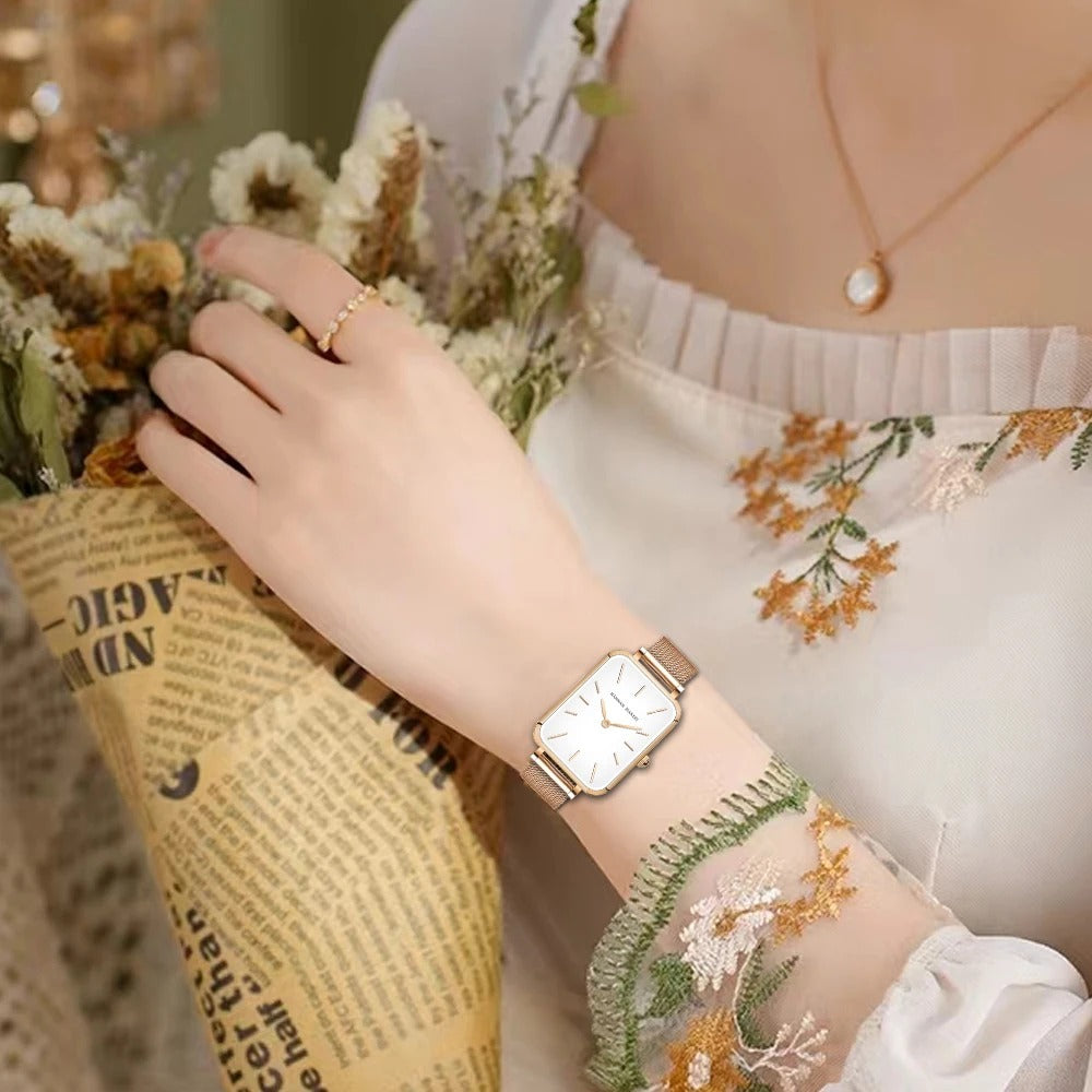 Elegant gold watch with minimalist design