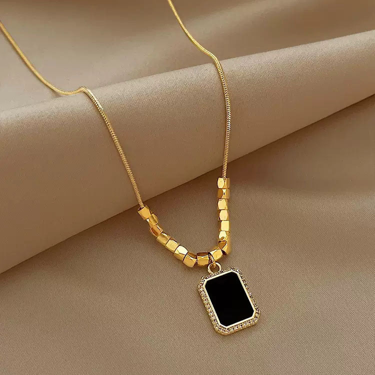 Handcrafted Onyx Necklace with gold-plated sterling silver and polished onyx stone